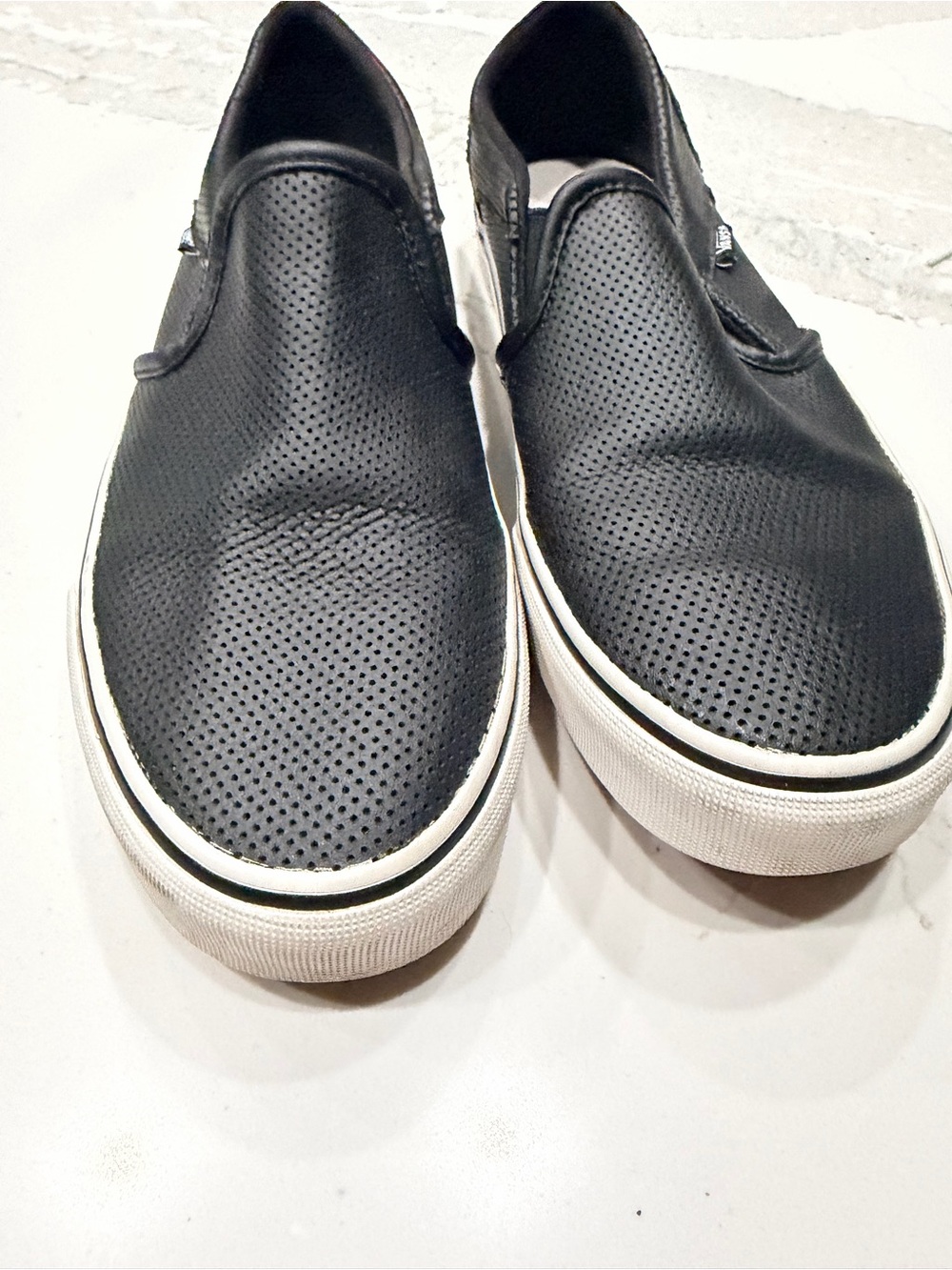 Vans Black Perforated Slip-On Sneakers with White Sole